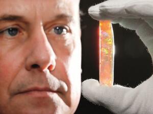 South Australian Museum Director Brian Oldman with the Virgin Rainbow opal — one of the highlights of the exhibition. (Peninsula) South Australian Museum Director Brian Oldman with the Virgin Rainbow opal — one of the highlights of the exhibition. (Peninsula)