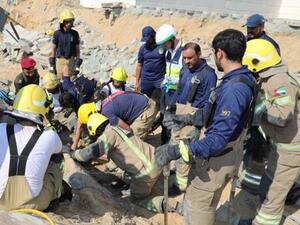 The workers were doing excavation work behind the house when the three-meter wall collapsed on them (Ajman Police)