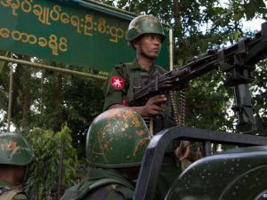 Myanmar soldiers stand guard in Maungdaw in Myanmar's northern Rakhine state (AFP/File Photo)	