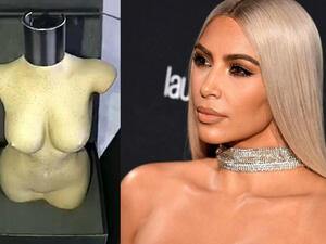 Kim Kardashian finally released images of her new KKW Body fragrance bottle that was modeled after her own shapely figure on Wednesday. (Source: Kim Kardashian - Snapchat - Angela Weiss - AFP)