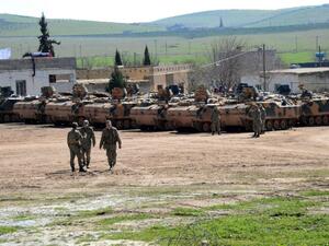 Turkish tanks wait near the Syrian border in Suruc in February 2015. (AFP/Ilyas Akengin)