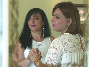 Twenty years after their first wedding Galit, left, and Amit remarried as wife and wife. Footage shows the couple beaming from ear to ear, wearing matching white dresses and dancing a song that translates to 'Blessed be he who made me a woman' (dailymail)