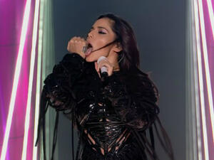 Racy: During one particularly seductive move, the singer licked her hand (Source: ITV) Racy: During one particularly seductive move, the singer licked her hand (Source: ITV)