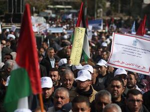 Palestinian protesters demonstrate in Gaza City on January 29, 2018 against the US move to freeze funding for a UN agency helping Palestinian refugees. (AFP) Palestinian protesters demonstrate in Gaza City on January 29, 2018 against the US move to freeze funding for a UN agency helping Palestinian refugees. (AFP)