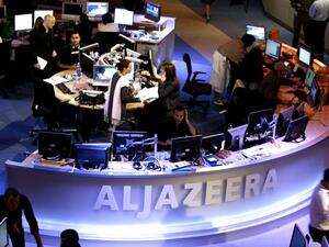 Qatar-based Al-Jazeera under fire (AFP/File Photo)	