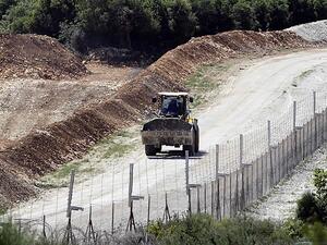 Israeli wall juts into Lebanese territory (AFP/File Photo)	