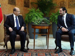Lebanon President Michel Aoun (L) with Saad al-Hariri. (AFP/ File Photo)