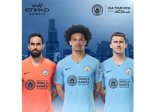 Claudio Bravo, Leroy Sane and Aymeric Laporte of Manchester City wearing the Special Olympics World Games 2019 Club Kit.
