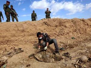 Earlier this year, army sources said security forces had stumbled upon two mass graves containing the remains of dozens of members of the Iraqi army and police who had been killed by ISIS in Hawija (AFP/File)