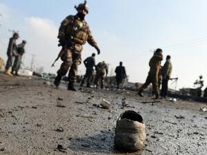 Soldier survey site of the deadly blast in Kabul which killed 57 people and injured 119.  (AFP/File Photo)