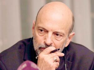 Jordanian Prime Minister Omar Razzaz during a meeting with union leaders in Amman, last June. (AFP/File)