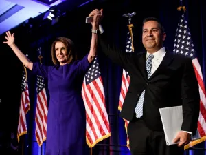 House Minority Leader Nancy Pelosi (D-CA) and Representative Ben Ray Lujan (D-MN), DCCC Chairman, celebrate a projected Democratic Party takeover of the House of Representatives during a midterm election night party hosted by the Democratic Congressional Campaign Committee on November 7, 2018 in Washington, DC. 
Brendan Smialowski / AFP