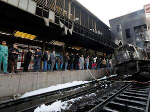 Dozens killed and injured in crash and fire at Cairo train station (Twitter)