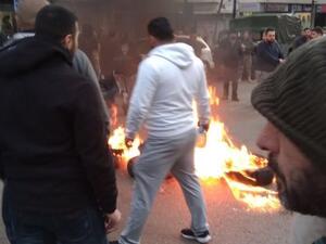 Berri's supporters rally, burn tires, block roads, and shoot bullets into the air (Twitter)
