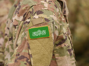 Flag of Hamas on soldier arm (Shutterstock)