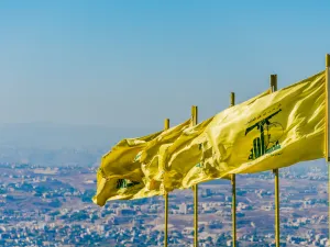 Hezbollah flags over southern Lebanese land (Shutterstock)