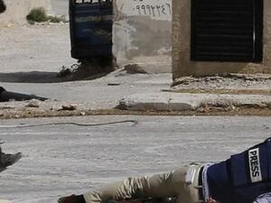 An AFP journalist takes cover during an attack in Syria. (AFP/File)