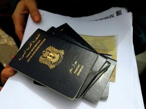 Syrian passports are coming under fire. (AFP/File)