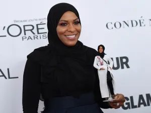 US Olympic medalist Ibtihaj Muhammad with her Barbie model. (AFP)