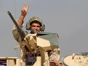 Growing cooperation between Iraq, Iran, Syria, and Russia has extended to coordination on intelligence and military operations. (AFP/Ahmad al-Rubaye))