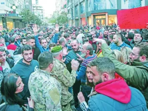 150 people gathered in central Beirut and chanted slogans against Lebanon’s politicians, calling them “corrupt.” (AFP)