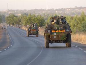 French army soldiers stand on armoured vehicles as they leave Bamako. (AFP PHOTO /ERIC FEFERBERG) French army soldiers stand on armoured vehicles as they leave Bamako. (AFP PHOTO /ERIC FEFERBERG)
