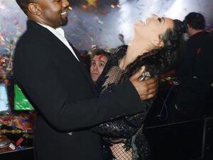 Kanye and Kim in a tender embrace.