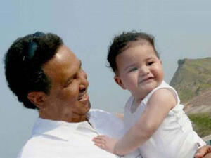 Proud Daddy Mohammed Abdo and his son Khaled (Image: Facebook)