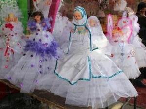 The veiled dolls made especially for the occasion.