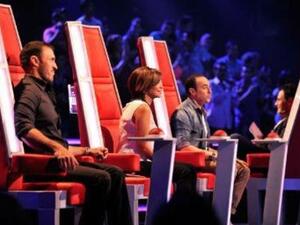 Judges on The Voice show (Sherine Abdel Wahab center).