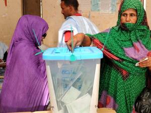 A Mauritanian woman casts her ballot at a polling station in Nouakchott. (AFP/ File)
