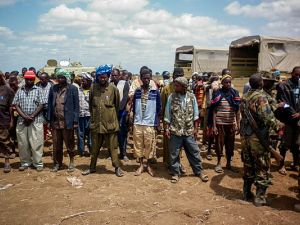 Members of Al Shabaab stand after giving themselves up to forces of the African Union Mission in Somalia 22 September 2012 (Wikimedia Commons)