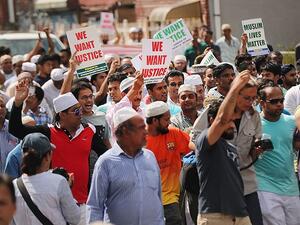 People march after a mass prayer for Imam Akonjee and his assistant in New York on Aug 15. (AFP)