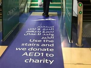 Thousands of Dubai metro users are taking the stairs to help raise funds for charity.  Thousands of Dubai metro users are taking the stairs to help raise funds for charity.