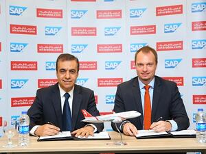 Adel Al Ali, Group Chief Executive Officer, Air Arabia and Julien Bertin, Managing Director, SAP.