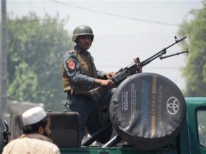 An Afghan soldier stands guard atop a vehicle near the site of an attack in Jalalabad on July 31, 2018. (AFP/ File photo)