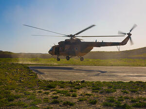An Afghan National Army rescue helicopter lands at Combat Outpost Lily, Paktika province, Afghanistan, May 20, 2013 (Wikimedia)