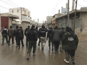 Ahrar al-Sham is being discussed as part of the possible merger (AFP/File)