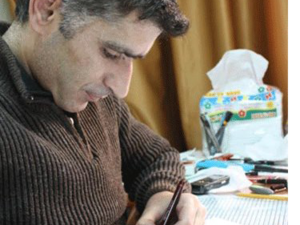 No one's heard from Raslan in more than three years, has the political cartoonist been dead since 2013? (AFP/File)