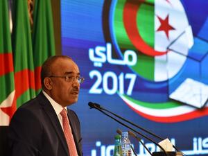 Algerian InteriorMinister Noureddine Bedoui announces the results of the country's legislative elections. (Ryad Kramdi/AFP)