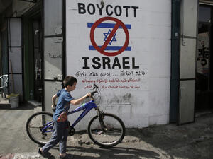 The BDS movement was founded in July 2005 by a swath of Palestinian civil society as a peaceful movement to restore Palestinian rights in accordance with international law. (AFP/File) 