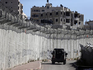 Al-Ram is separated from Jerusalem by Israel's 'separation barrier' (AFP/File)