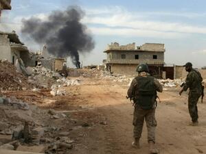 Syrian government forces walked in the southern outskirts of Aleppo on October 25, 2016, where fighting had resumed after a three-day ceasefire ended without civilian evacuations. (AFP/File)