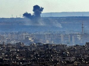 Smoke billows from the southern suburbs of Aleppo during fighting between regime forces and rebel fighters on December 3, 2016. (AFP/George Ourfalian)
