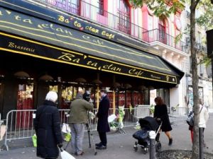 People walk in front of the Bataclan concert hall in Paris on November 11, 2016. (AFP/Miguel Medina)