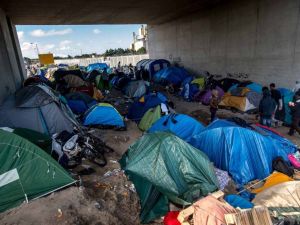 Migrant tents below a bridge in the Calais "Jungle." (AFP/Philippe Huguen)