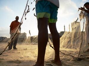 Palestinian fishermen on the beach in Gaza City. (AFP/Roberto Schmidt)