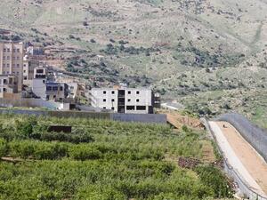View from Israeli-occupied sector of Golan Heights shows border with Syria near village of Majdal Shmas. (AFP/File)