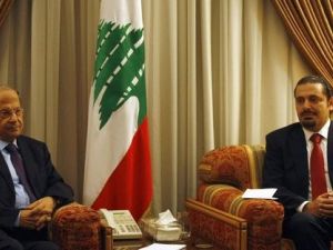 Lebanon's new president, Michel Aoun, and former prime minister, Saad al-Hariri. (AFP/File) 