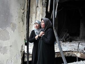 Iraqi women surveil the aftermath of a massive bombing in Baghdad's Karrada neighbourhood on July 4, 2016. (AFP/File)

